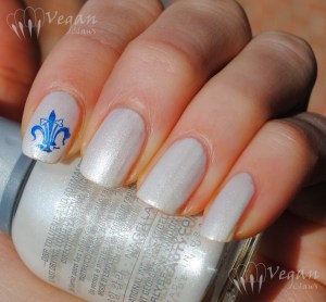 Orly Au Champagne stamped with Kleancolor Metallic Sapphire