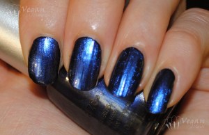 China Glaze Want My Bawdy over black, with flash